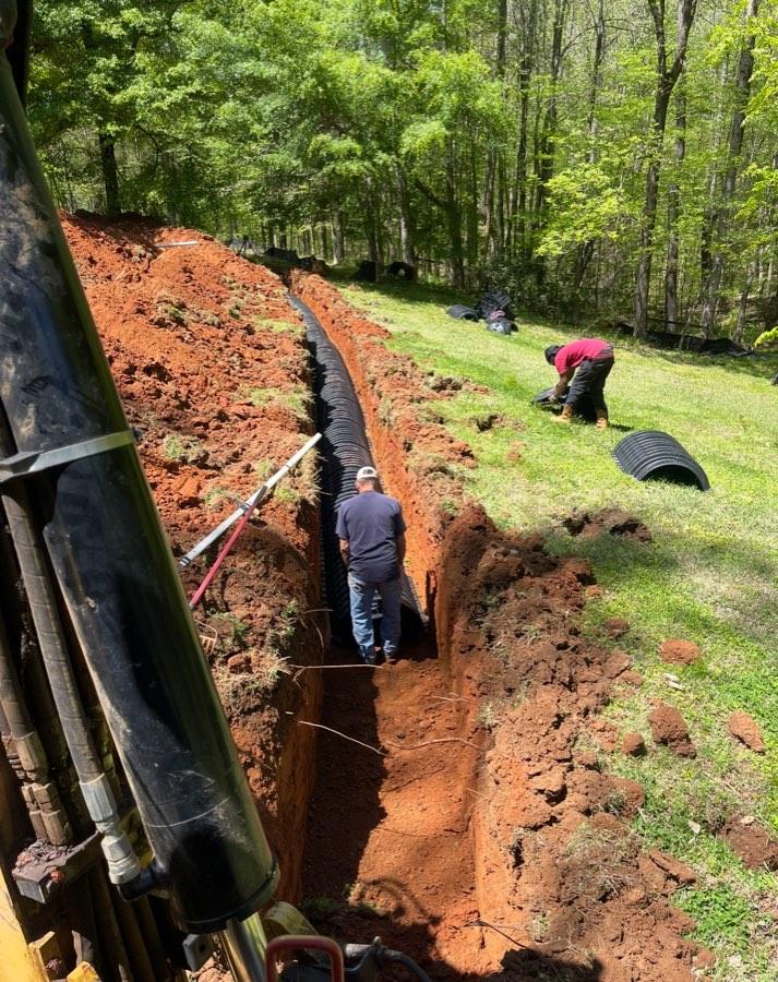 Drain field pipe installation