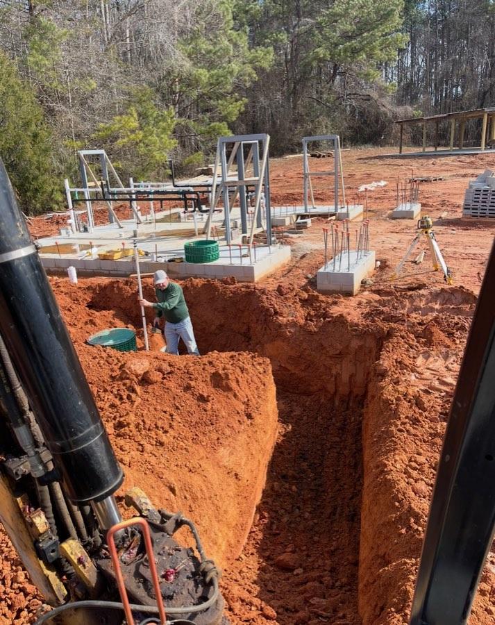 Septic system installation from the cab