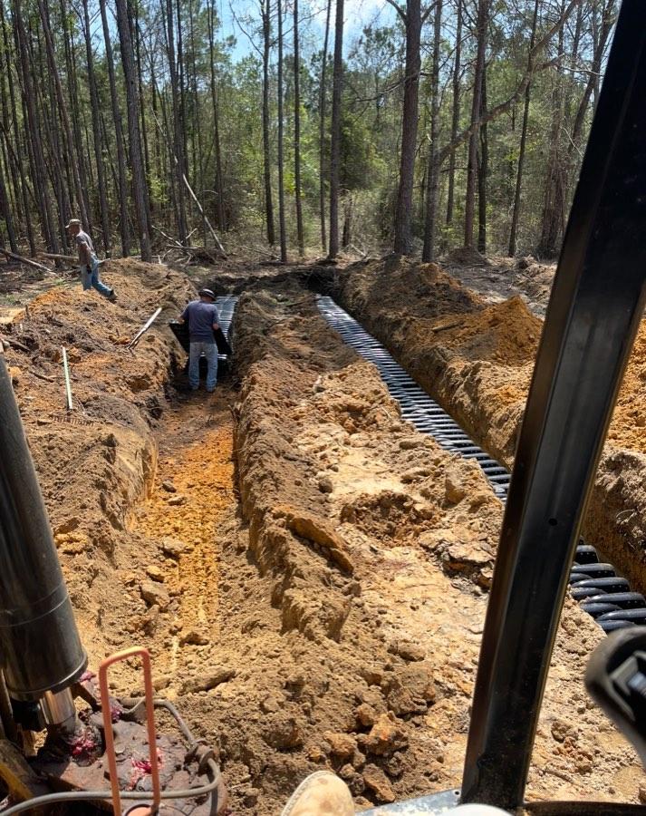 Drain field trenching in progress